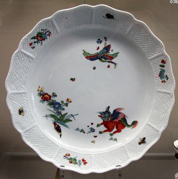 Meissen porcelain plate painted with crane flying above kylin beast of Chinese mythology (c1740) at Meissen porcelain museum at Lustheim Palace. Munich, Germany.