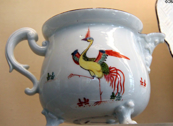 Meissen porcelain creamer (c1740s?) with phoenix? In Hecke style at Meissen porcelain museum at Lustheim Palace. Munich, Germany.