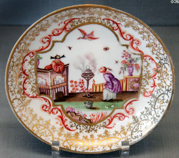 Meissen porcelain small plate with Chinese painting (c1725) by A.E. Wald or S. Hosennestel at Meissen porcelain museum at Lustheim Palace. Munich, Germany.