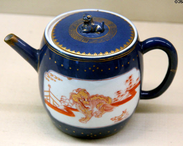 Meissen porcelain blue teapot painted with red & yellow Chinese lion at Meissen porcelain museum at Lustheim Palace. Munich, Germany.