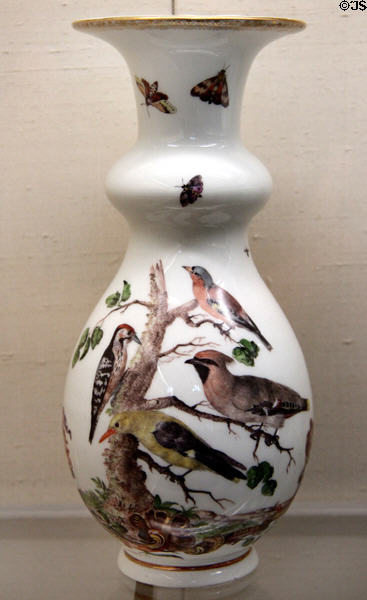Meissen porcelain white vase (c1745) painted with birds & insects at Meissen porcelain museum at Lustheim Palace. Munich, Germany.