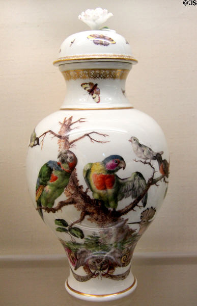 Meissen porcelain covered white vase (c1745) painted with birds & insects at Meissen porcelain museum at Lustheim Palace. Munich, Germany.