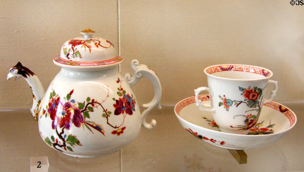 Meissen porcelain teapot & cup (c1735) in "Rose Family" decor at Meissen porcelain museum at Lustheim Palace. Munich, Germany.