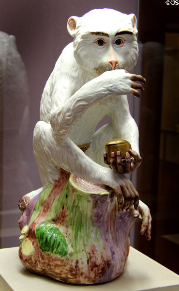 Meissen porcelain figure of monkey with snuffbox (c1732) by Gottlieb Kirchner at Meissen porcelain museum at Lustheim Palace. Munich, Germany.