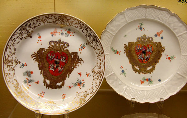 Meissen porcelain plates (1730-3) with coat of arms of Saxon-Polish alliance coronation service at Meissen porcelain museum at Lustheim Palace. Munich, Germany.
