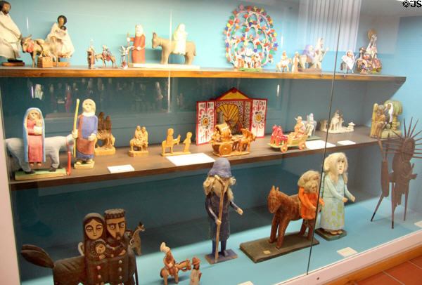 Flight into Egypt figures from several Christian countries at folk art Collection Gertrud Weinhold. Munich, Germany.
