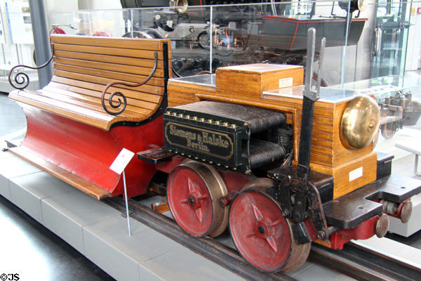 First Electric Locomotive (1879) by Siemens & Halske of Berlin pulled bench on car at Deutsches Museum Transport Museum. Munich, Germany.