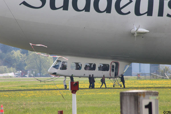 Passengers embarking Süddeutsche Zeitung zeppelin visiting Flugwerft Schleissheim. Munich, Germany.