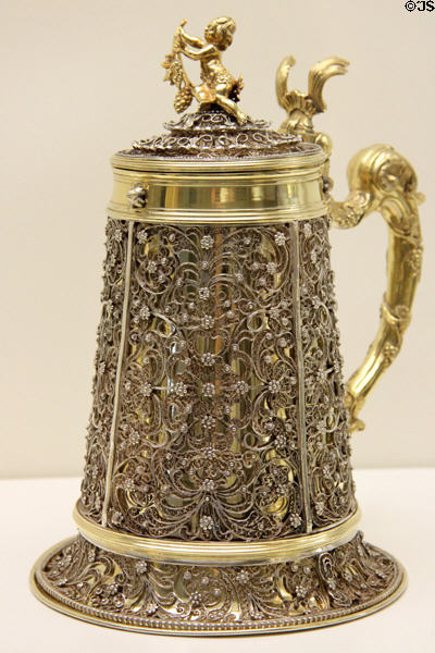 Lidded tankard with finely worked gold & silver relief, handle & filigree (1763-5) by goldsmith Johann Jakob Adam from Augsburg at Maximilian Museum. Augsburg, Germany.