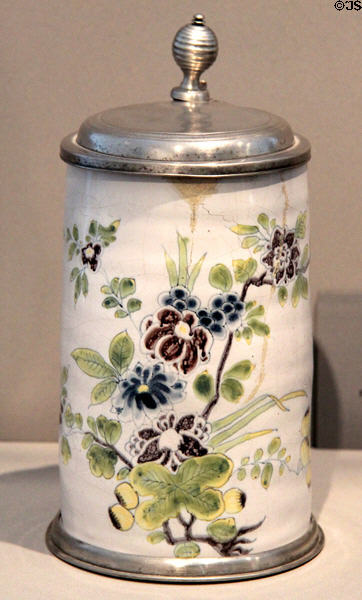 Covered beaker painted with Oriental flowers (1753) from Augsburg at Maximilian Museum. Augsburg, Germany.