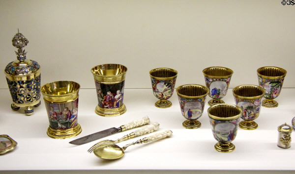 Drinking vessels with painted scenes & gold trim (c1830) made by Nymphenburg Porcelain of Munich at Maximilian Museum. Augsburg, Germany.
