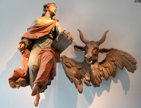 Symbols of Evangelists St. John (angel) & St. Luke (bull) statues (1760) by Ignaz Günther from Munich at Maximilian Museum. Augsburg, Germany.