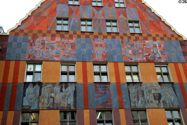 Details of modern colorful frescos on Weberhaus Augsburg heritage building at Moritzplatz. Augsburg, Germany.
