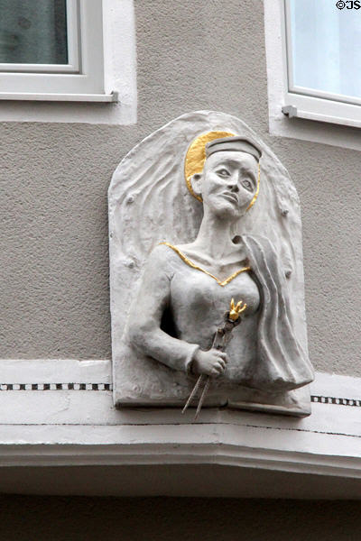 Carving of St Apollonia tortured by having her teeth violently pulled. Augsburg, Germany.