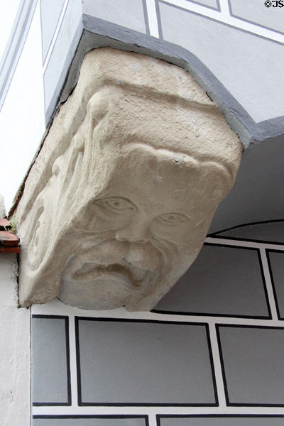 Stone corbel carved with mustached face. Augsburg, Germany.