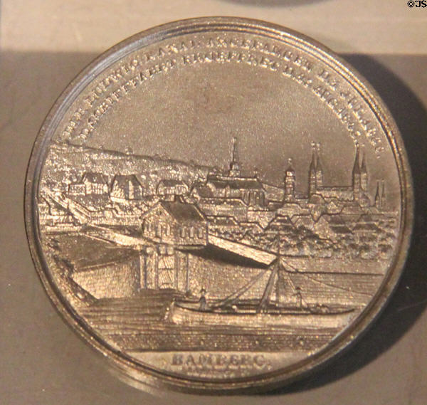 Medallion marking Bamberg canal opening (1845) by F. Rabausch & J.J. Neuss of Augsburg at Bamberg City Museum. Bamberg, Germany.