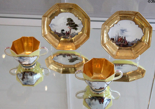 Meissen porcelain chocolate cups with gold decor (c1735) at Bamberg Old Town Hall Museum of Faience & Porcelain. Bamberg, Germany.