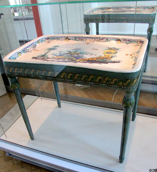 Tea table with faience top (1772) Stralsund at Bamberg Old Town Hall Museum of Faience & Porcelain. Bamberg, Germany.
