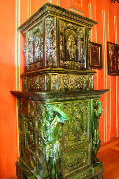 Ceramic stove in guests living room (late 19thC) by Grossmann Co. of Nuremberg or Coburg at Coburg Castle. Coburg, Germany.