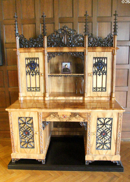 Carved, veneered & brass trimmed desk (c1855) by Tobias Hoffmeister from Coburg at Coburg Castle. Coburg, Germany.