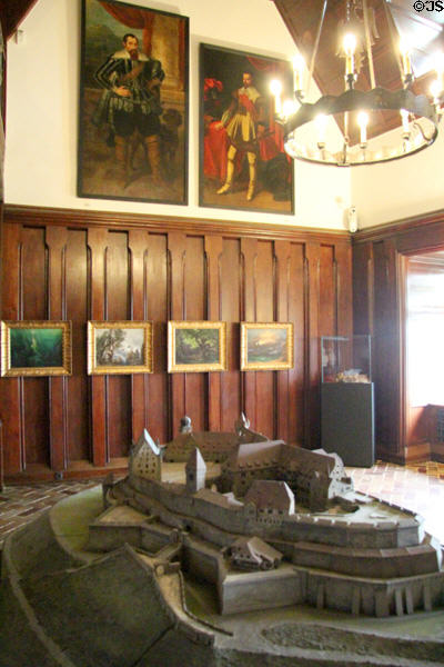 Smoking room with model of Coburg Castle & paintings of figures of Thirty Years War. Coburg, Germany.