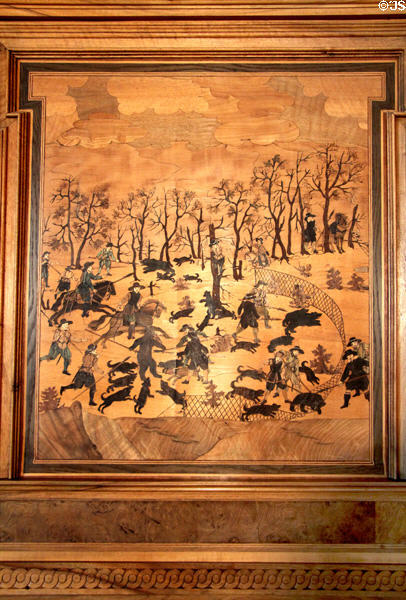 Dogs hunting bears detail of Intarsia wood mosaics panel (before 1633) by Wolfgang Birkner in Intarsia Hunting Room at Coburg Castle. Coburg, Germany.