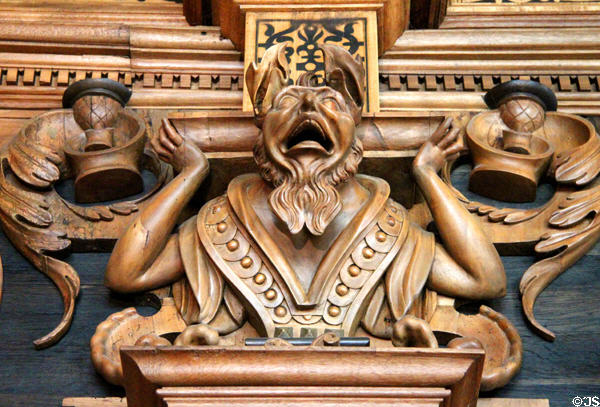 Grotesque figure carved in Intarsia Hunting Room at Coburg Castle. Coburg, Germany.