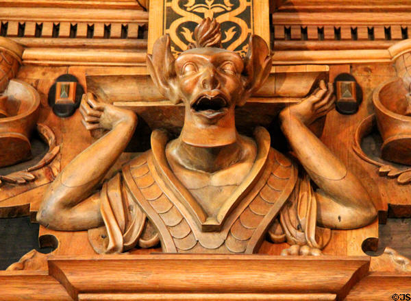 Grotesque figure carved in Intarsia Hunting Room at Coburg Castle. Coburg, Germany.