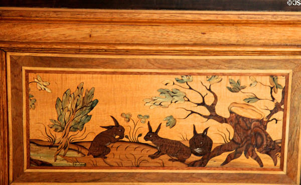 Detail of Intarsia wood mosaics panel of rabbits in Intarsia Hunting Room at Coburg Castle. Coburg, Germany.