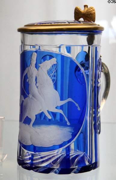 Two-colored krug where outer blue color is cut away & etched to show military rider (c1850) from northern Bohemia at Coburg Castle. Coburg, Germany.