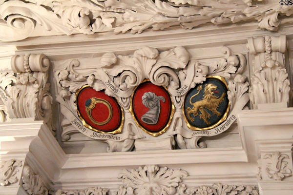 Heraldic arms in Hall of Giants (1697-9) with stuccowork details at Ehrenburg Palace. Coburg, Germany.