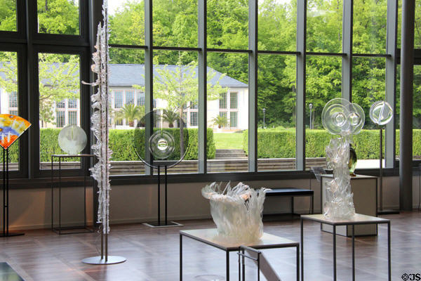 Collection pieces against windows of European Museum for Modern Glass. Coburg, Germany.