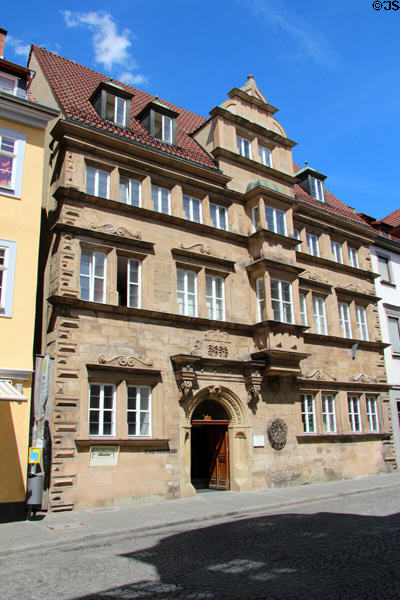 Stone city library with oriel window. Coburg, Germany.