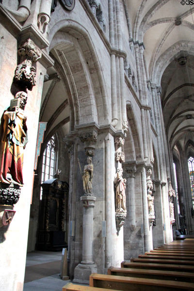 Saints carved on columns in St Sebaldus Church. Nuremberg, Germany.