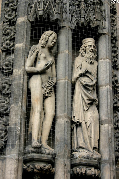 Eve & prophet beside door of St Lawrence Church. Nuremberg, Germany.