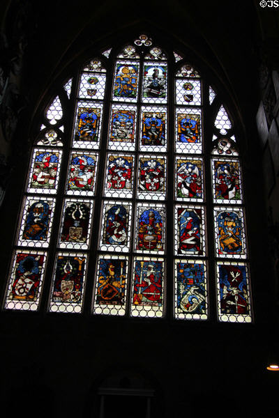 Stained glass window with heraldic shields at St. Lawrence Church. Nuremberg, Germany.