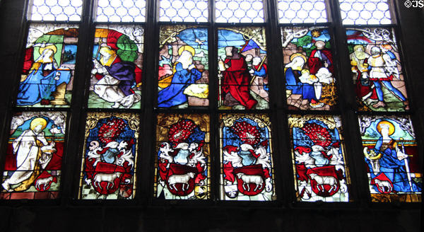 Stained glass window with Nativity scenes at St. Lawrence Church. Nuremberg, Germany.
