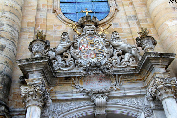 Carved Baroque coat of arms over doorway at Gößweinstein pilgrimage basilica. Gößweinstein, Germany.
