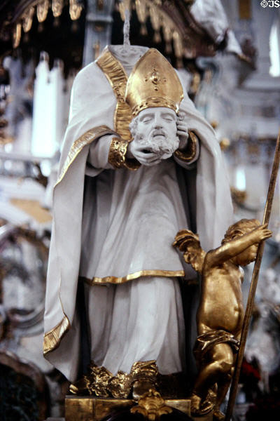 Statue of St Denis (Dionysius) martyred bishop at 14-Saints Basilica. Bad Staffelstein, Germany.