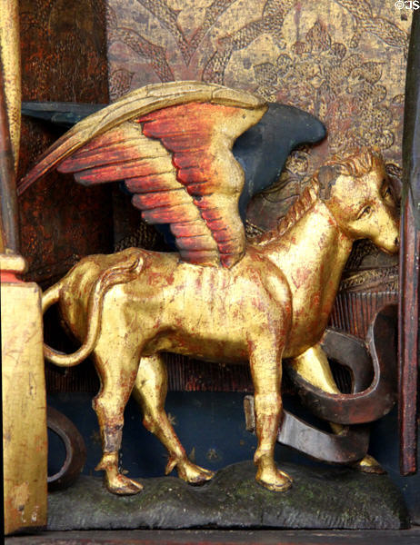 Winged bull symbol of Evangelist Luke detail of Life of Madonna altarpiece (c1500) from Western Franconia at Germanisches Nationalmuseum. Nuremberg, Germany.