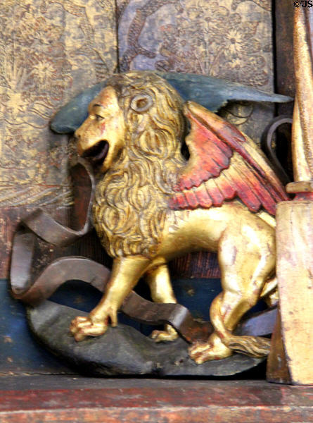 Winged lion symbol of Evangelist Mark detail of Life of Madonna altarpiece (c1500) from Western Franconia at Germanisches Nationalmuseum. Nuremberg, Germany.