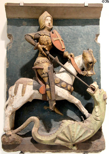 St George Slaying the Dragon sandstone house sign (mid 15thC) from Nuremberg at Germanisches Nationalmuseum. Nuremberg, Germany.