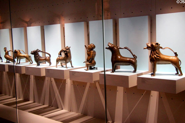 Collection of Middle Ages bronze aquamanili hand washing ewers shaped like lions, mythical beast or other figures at Germanisches Nationalmuseum. Nuremberg, Germany.