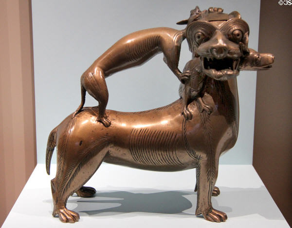 Bronze aquamanile in shape of lion with dog handle (c1200) from northern Germany at Germanisches Nationalmuseum. Nuremberg, Germany.
