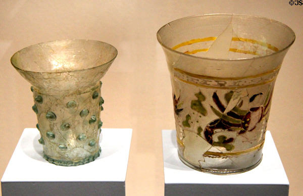 Glass beakers (l) with prunts for firm grip from southern Germany (c1300) & (r) with enameled decoration from Venice (14thC) at Germanisches Nationalmuseum. Nuremberg, Germany.