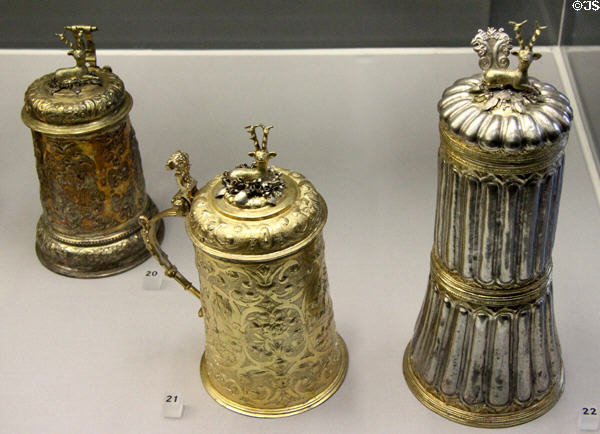 Covered silver tankards with stags on lid (17thC) from Germany at Germanisches Nationalmuseum. Nuremberg, Germany.