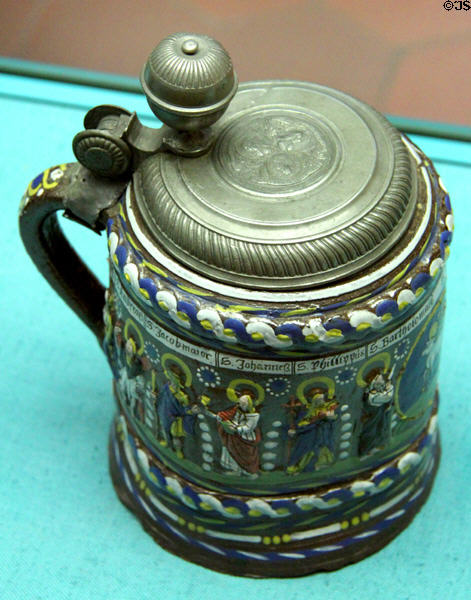 Enameled stoneware tankard with pewter mount (2nd half 17thC) from Creußen, Upper Franconia at Germanisches Nationalmuseum. Nuremberg, Germany.