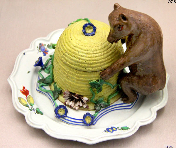 Faience honey pot in form of bear raiding hive (c1750) from Hanau at Germanisches Nationalmuseum. Nuremberg, Germany.