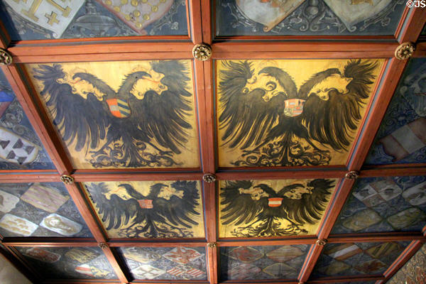 Ceiling with arms of Karl V painting in audience hall (c1520) by Hans Springinklee at Imperial Castle. Nuremberg, Germany.