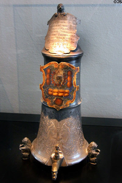 Baker's guild tin grinding flagon with spigot used for guild graduation of apprentices as journeymen (Schleifkanne) (1635) by Paulus Öham the Younger at Fembohaus City Museum. Nuremberg, Germany.